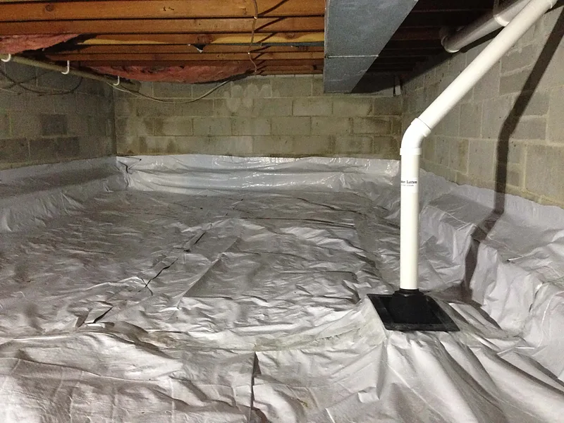Sealed crawl space membrane with a radon suction riser